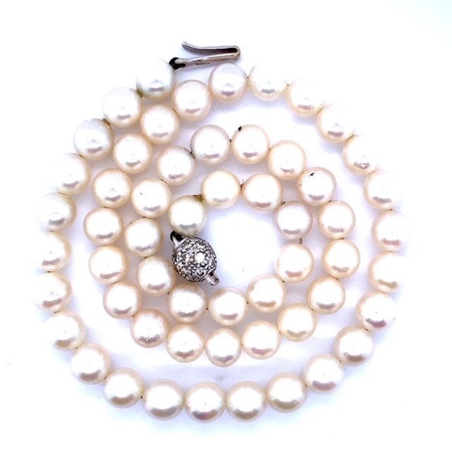 A Freshwater Pearl necklace with Diamond Set Ball Clasp