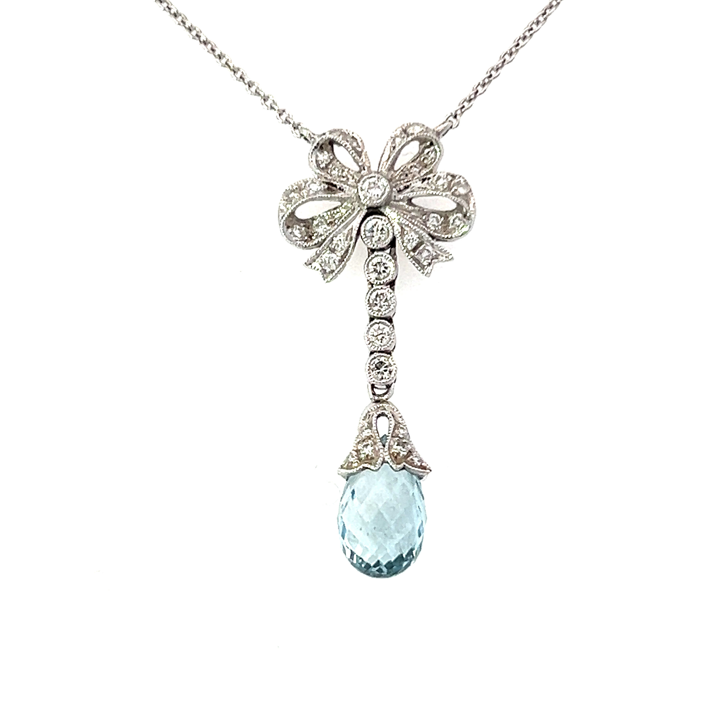 18ct white gold aquamarine and diamond bow style pendant