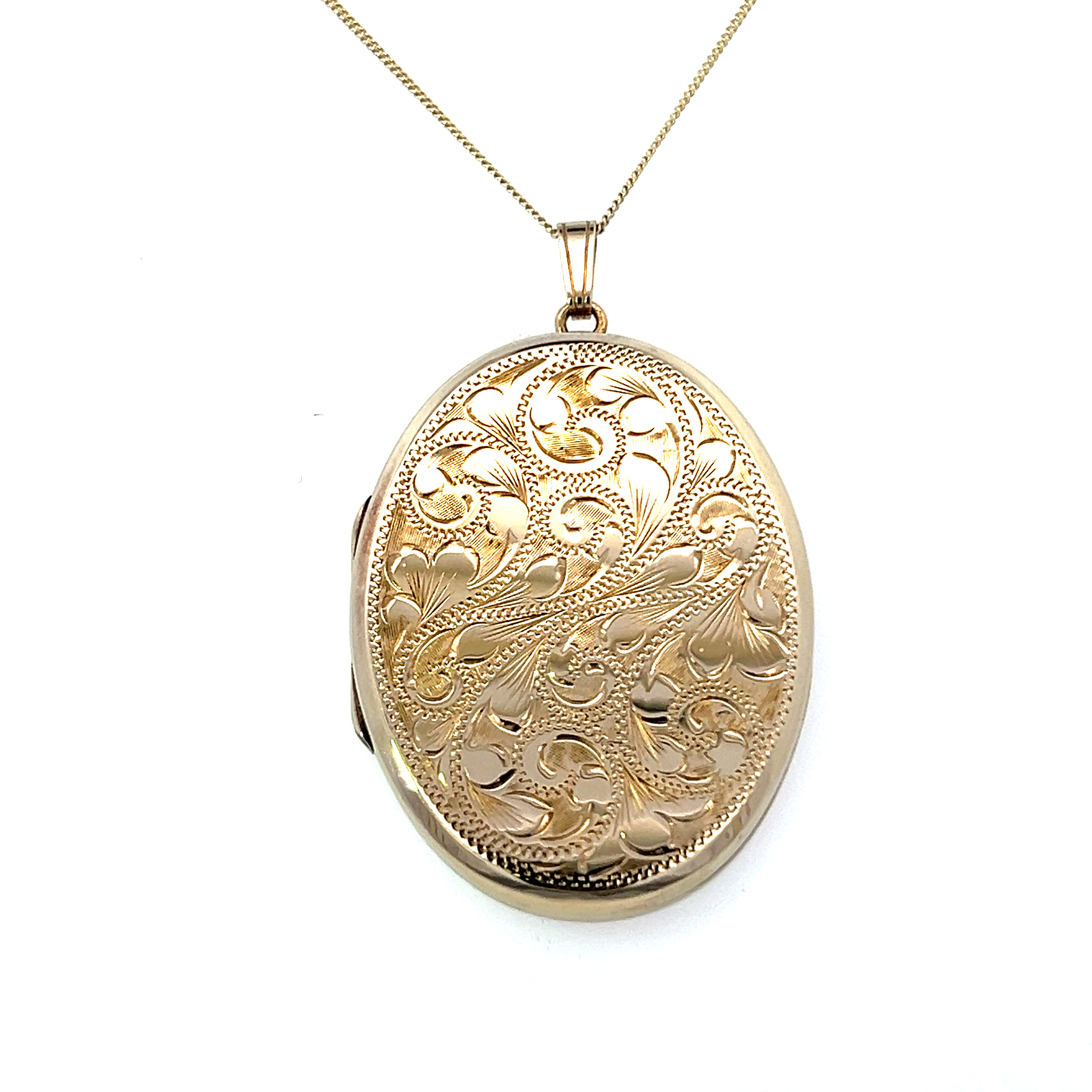 A 9 Carat Gold Engraved Oval Locket